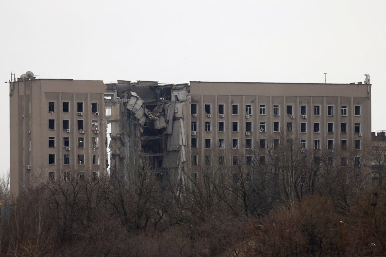 A destroyed part of a Ukrainian government administration building is seen in Mykolaiv