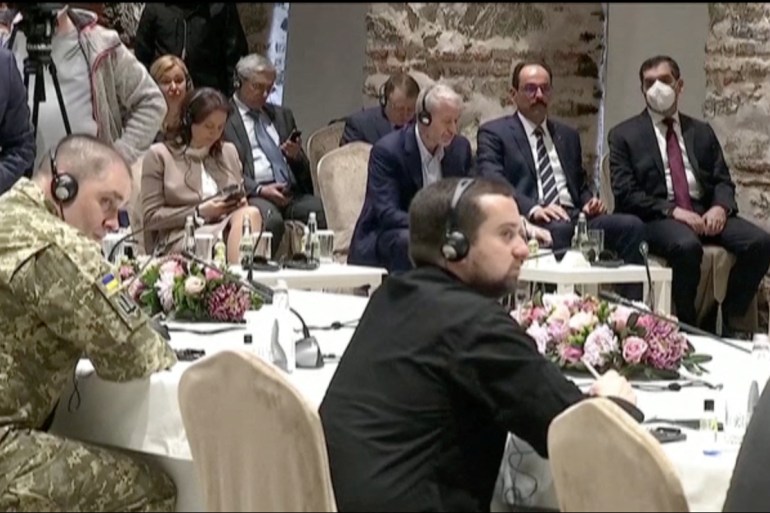 Russian billionaire Roman Abramovich listens as Turkish President Tayyip Erdogan (not seen) addresses Russian and Ukrainian negotiators 