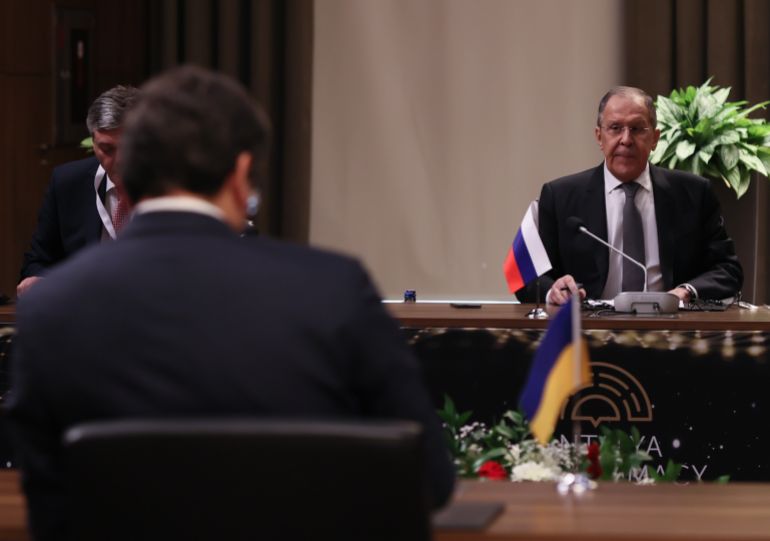 Sergey Lavrov and Dmytro Kuleba are seen holding talks