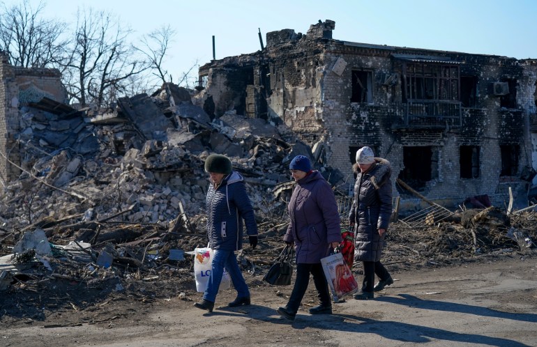 Civilians are seen in Mariupol