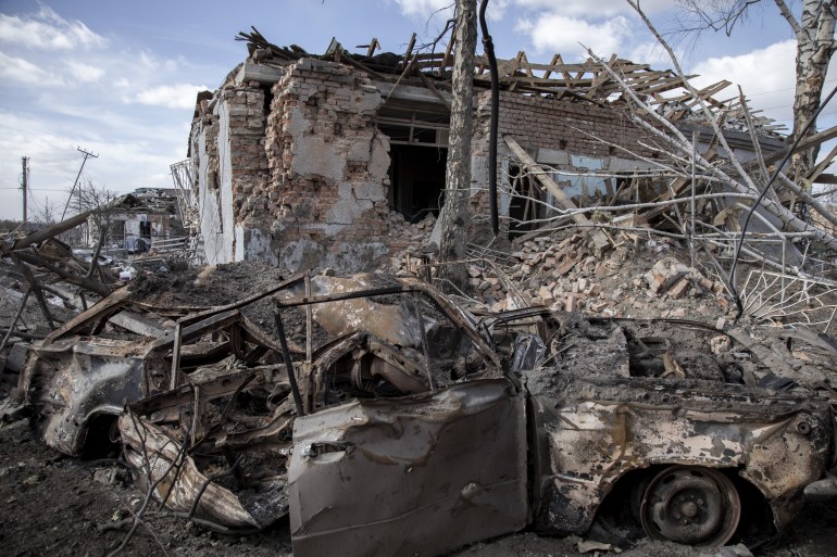 The aftermath of a Russian attack in Byshiv village, on the outskirts of Kyiv, that caused widespread destruction.
