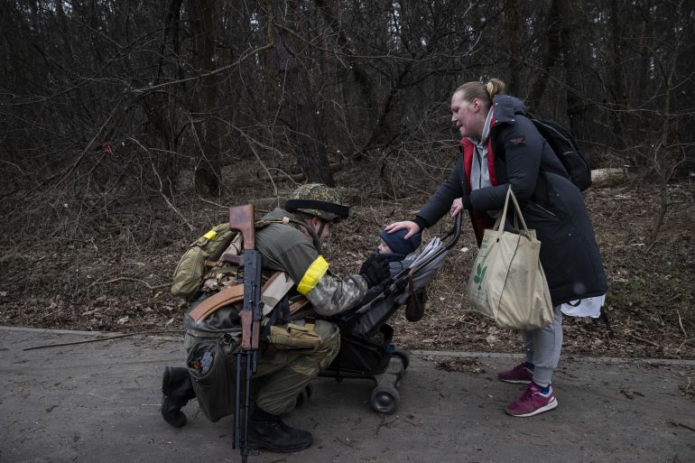 Civilians fleeing Irpin, Ukraine