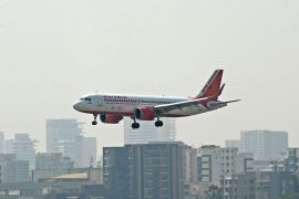 An Air India aircraft prepares to land at the Mumbai airport