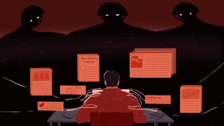 Illustration by JC of a man sitting at a desk, work-related documents floating above him as three large silhouetted soldiers loom over the scene, two of their hands grasping down at his shoulders.
