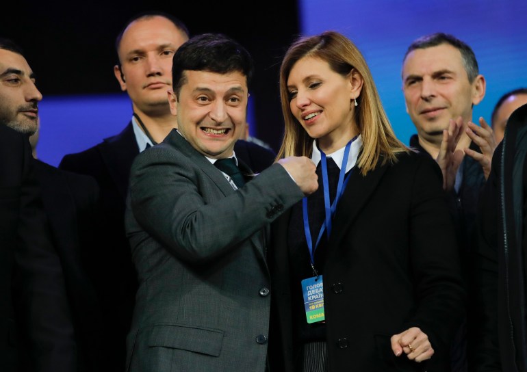 Volodymyr Zelenskiy, Ukrainian actor and candidate and his wife Olena Zelenska, react after debates between two candidates in the weekend presidential run-off at the Olympic stadium in Kiev, Ukraine, Friday, April 19, 2019. 