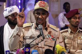 In this May 18, 2019 file photo, Gen. Mohammed Hamdan Dagalo, the deputy head of the military council that assumed power in Sudan after the overthrow of President Omar al-Bashir, speaks to journalists in Khartoum, Sudan