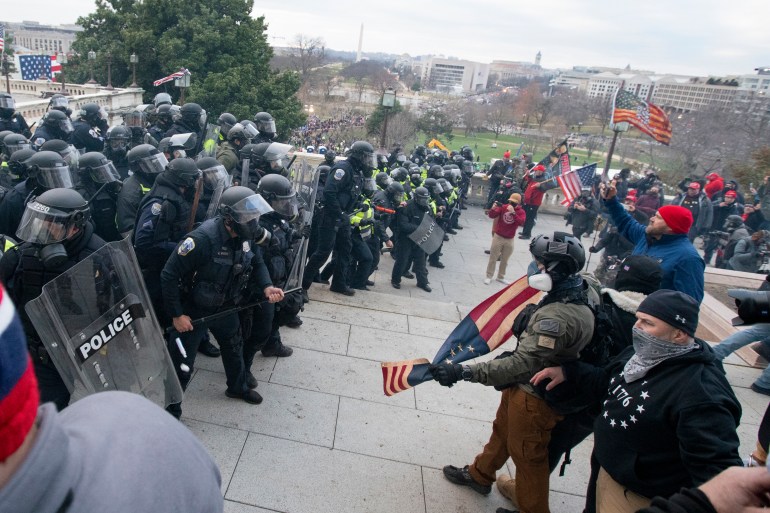 Rioters face off police on January 6 2021