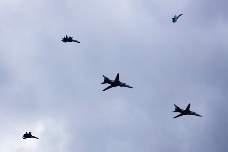 Two Tu-22M3 bombers escorted by Su-35 fighters of the Russian air force fly during the Union Courage-2022 Russia-Belarus military drills at the Obuz-Lesnovsky training ground in Belarus.