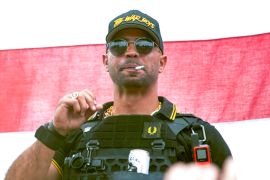 Proud Boys leader Henry "Enrique" Tarrio wears a hat that says The War Boys during a rally in Portland, Oregon.