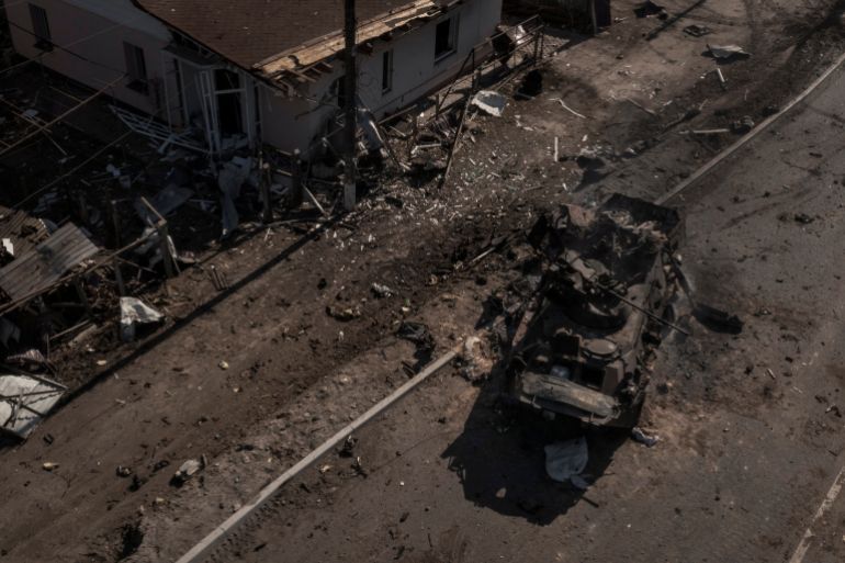 A destroyed Russian tank is seen after battles on a main road near Brovary, north of Kyiv.