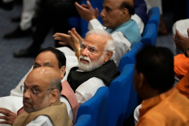 Indian Prime Minister Narendra Modi sits with senior Bhartiya Janata Party attend parliamentary committee