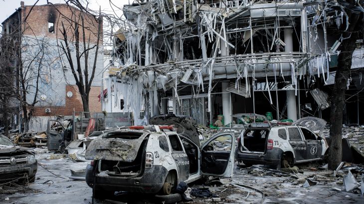 Damaged vehicles and buildings in Kharkiv city center in Ukraine