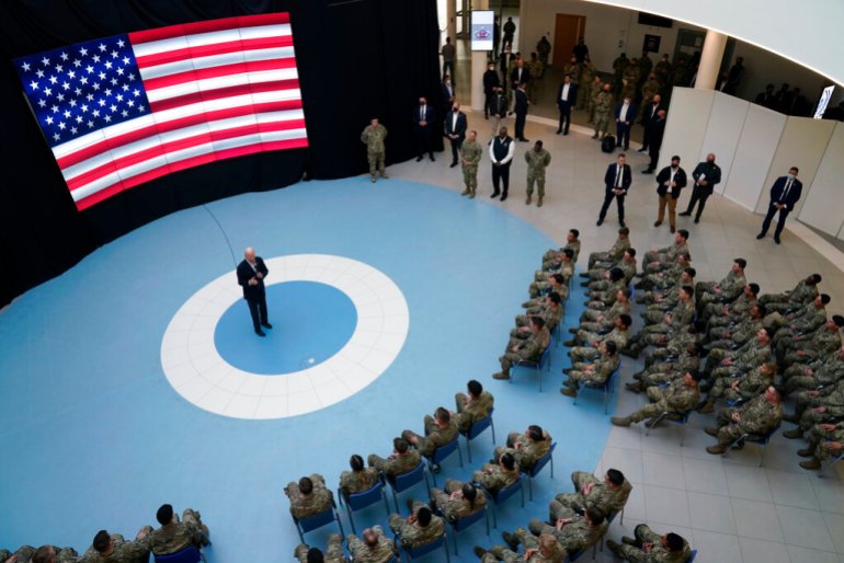 President Joe Biden speaks to members of the 82nd Airborne Division at the G2A Arena in Jasionka, Poland.