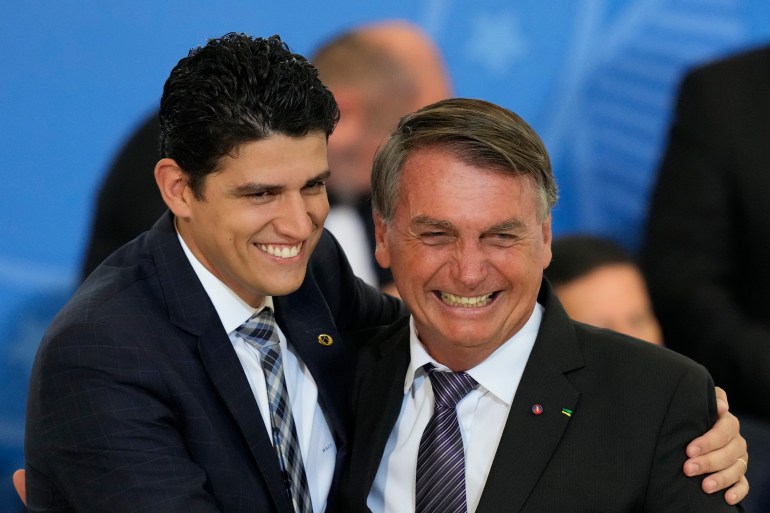 Bolsonaro hugging Marcelo Sampaio