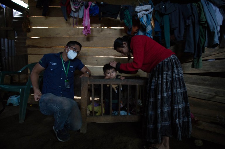 Doctor Ricardo Valdez visits the home of Margarita Xol to check on her children who have suffered from malnutrition and pneumonia.