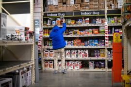 A shopper reaches for pesticide products at a Home Depot store in Wilmington, Delaware U.S.