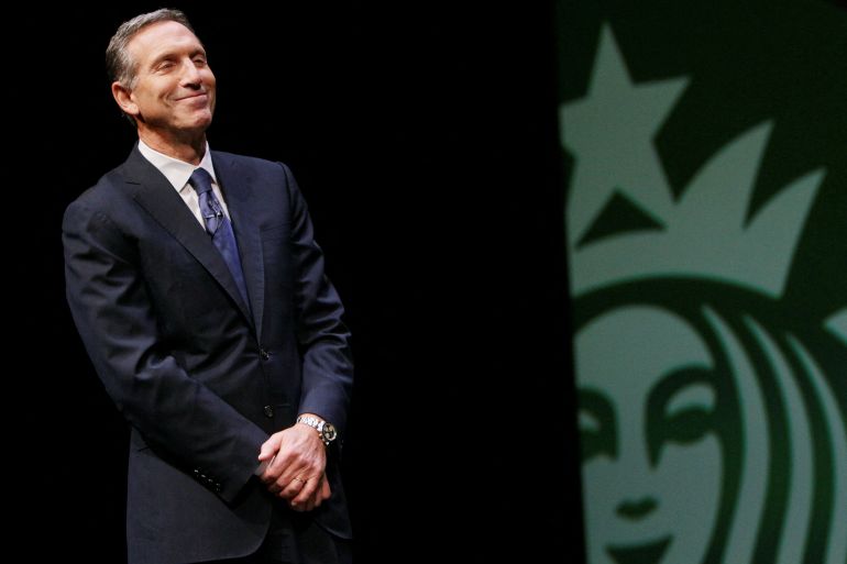 Starbucks's Howard Schultz looks on during its annual meeting of shareholders in Seattle, Washington