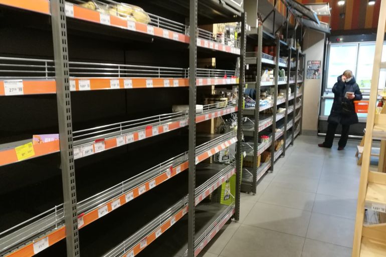 Empty shelves in a Kyiv supermarket