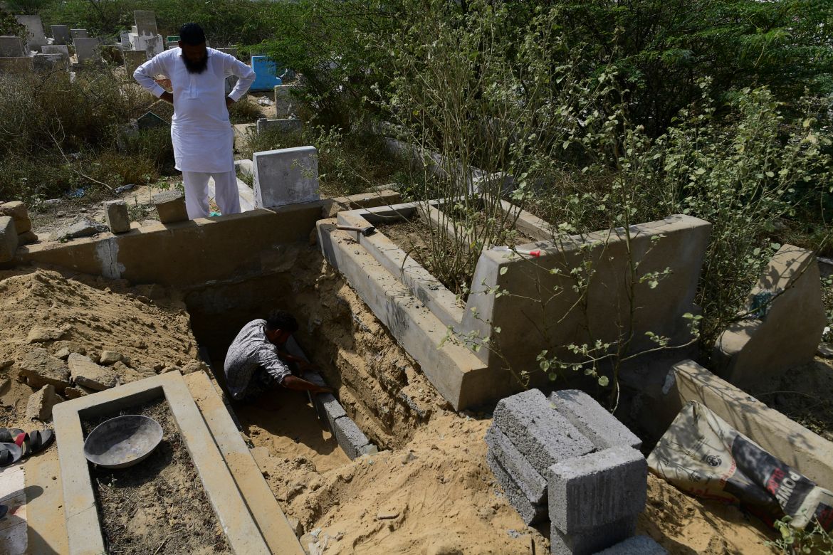 a gravedigger builds a new grave