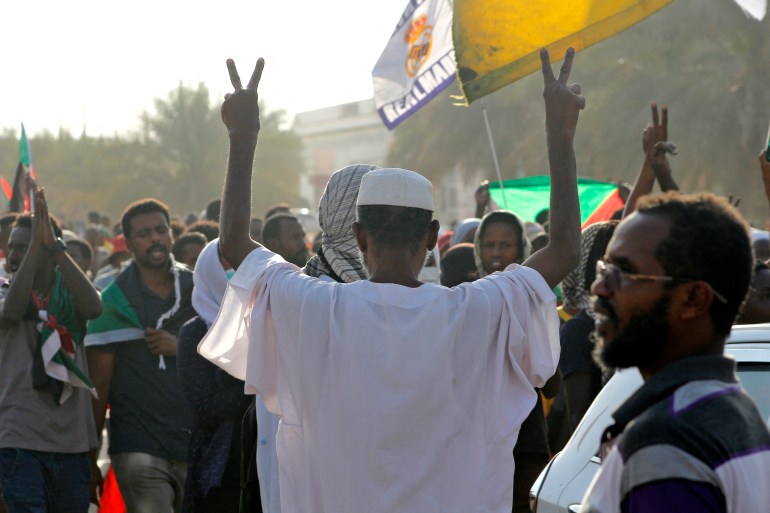 Sudanese protesters take part in a rally on April 6 