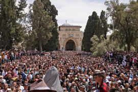 Palestinians gather in Jerusalem's Al-Aqsa Mosque complex following prayers of the third Friday of the Muslim holy month of Ramadan