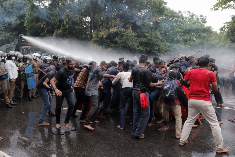 Police use water cannon on demonstrators during a protest against Sri Lankan President Gotabaya Rajapaksa near the parliament, amid the country's economic crisis in Colombo, Sri Lanka, April 8, 2022.