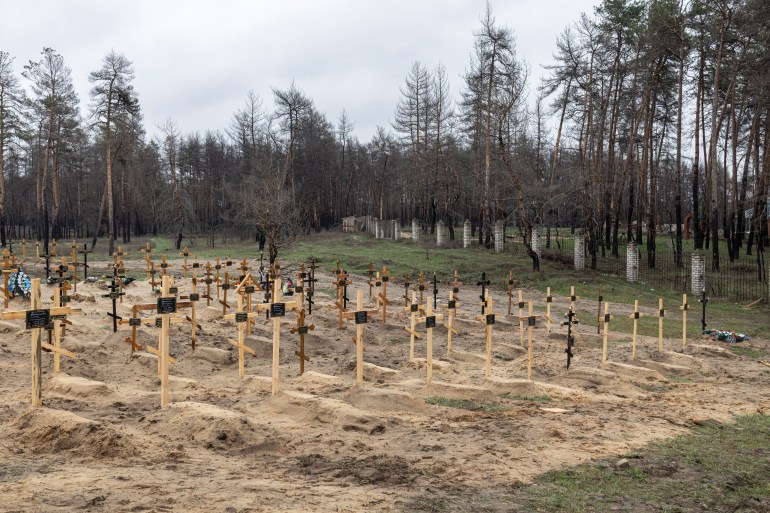 A new cemetery near a local church is pictured in the town of Severodonetsk, Luhansk region, Ukraine