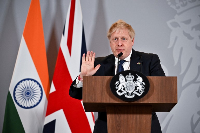 British Prime Minister Boris Johnson gestures as he speaks during a news conference in New Delhi, India, April 22, 2022