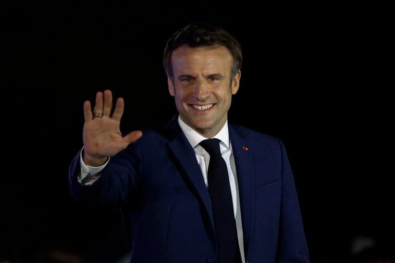 French President Emmanuel Macron arrives to deliver a speech after being re-elected as president