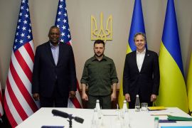 Ukraine's President Volodymyr Zelenskiy poses for a picture with U.S. Secretary of State Antony Blinken and U.S. Defense Secretary Lloyd Austin before a meeting, as Russia's attack on Ukraine continues, in Kyiv, Ukraine.