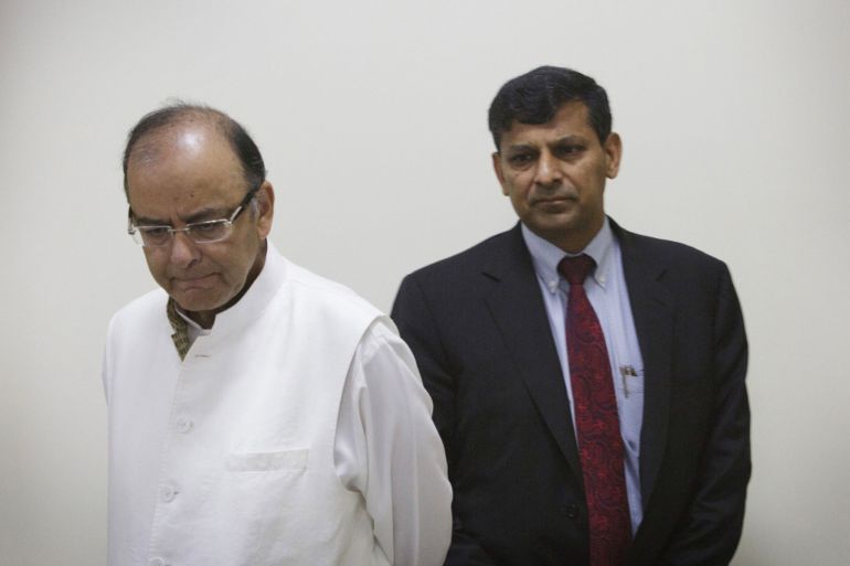 Arun Jaitley, India's finance minister, and Raghuram Rajan, governor of the Reserve Bank of India (RBI), arrive for a news conference in Delhi, India