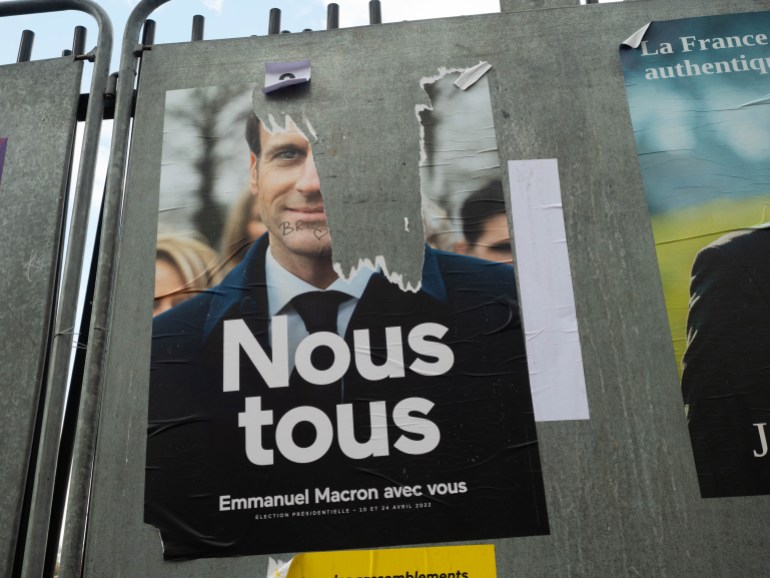 A campaign poster of Macron in Beaudottes