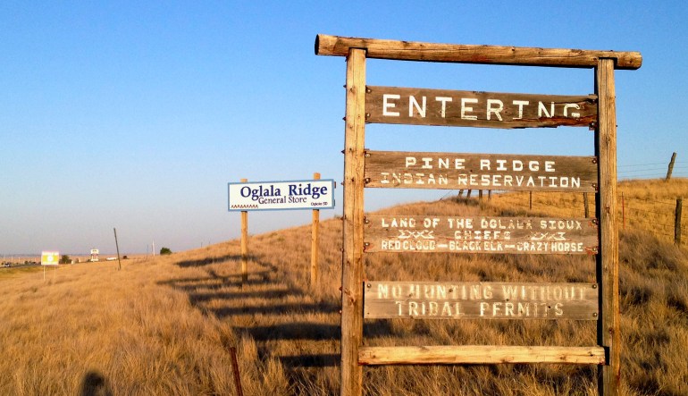 A photo of the Pine Ridge Indian Reservation entrance.