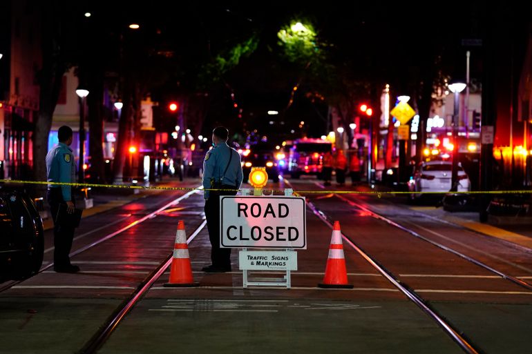A roadblock is set a block away from the scene of an apparent mass shooting in Sacramento, California