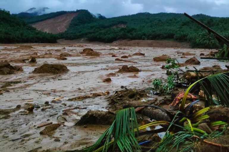 Torrents of mud and brown water at a landslide area at Baybay City, Leyte province, the Philippines.