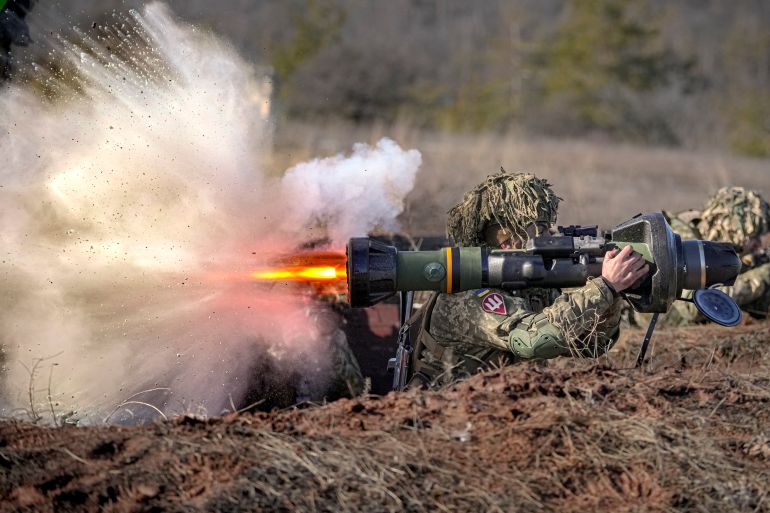 A photo of a Ukrainian serviceman firing a NLAW anti-tank weapon.