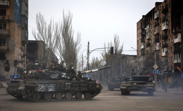 Russian military vehicles are seen in Mariupol