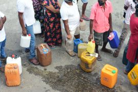 people queue up for hours in order to be able to purchase kerosene for cooking