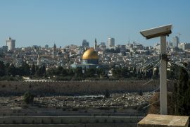 A security camera is seen next to the Dome of Rock in Jerusalem