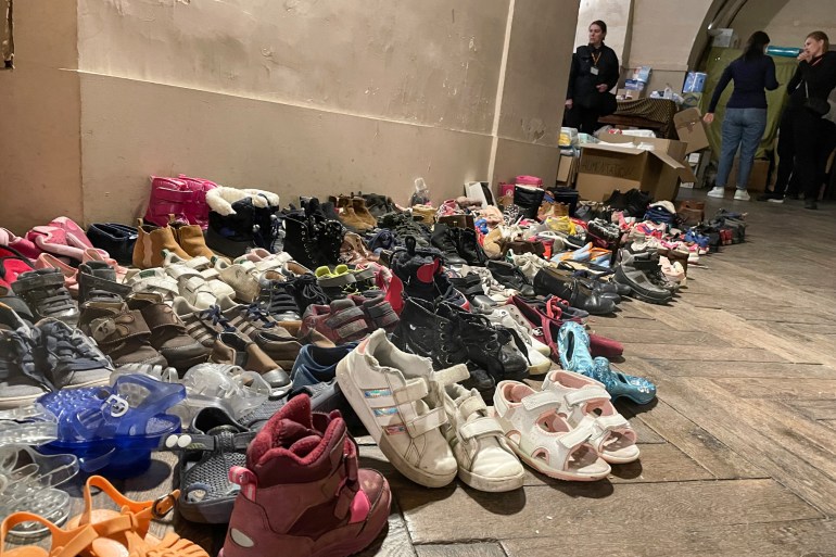 Children shoes are seen in the Saint Sulpice Church as part of of donation drive for Ukrainian refugees