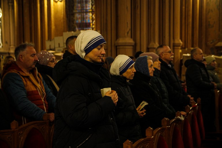 Residents in St Nicholas Catholic Church, Kyiv