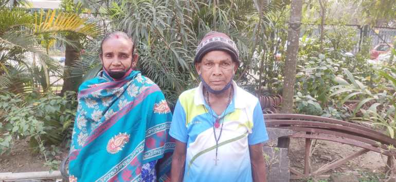 Meeru Tudu and his husband Iswar Tudu in their village in West Bengal, India