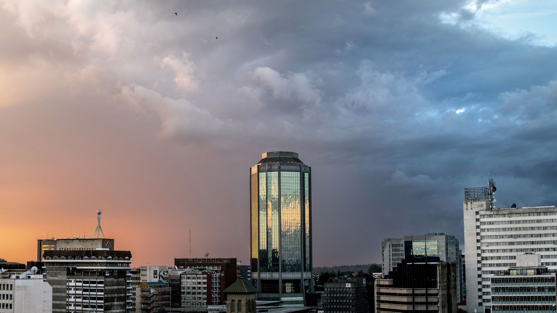 A photo of the Reserve Bank of Zimbabwe in the the Harare skyline.