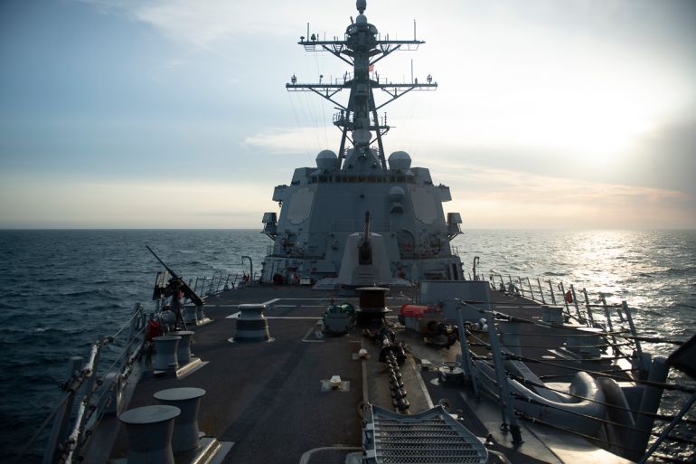 A view down the deck of the USS Sampson as it travels through the Taiwan Strait
