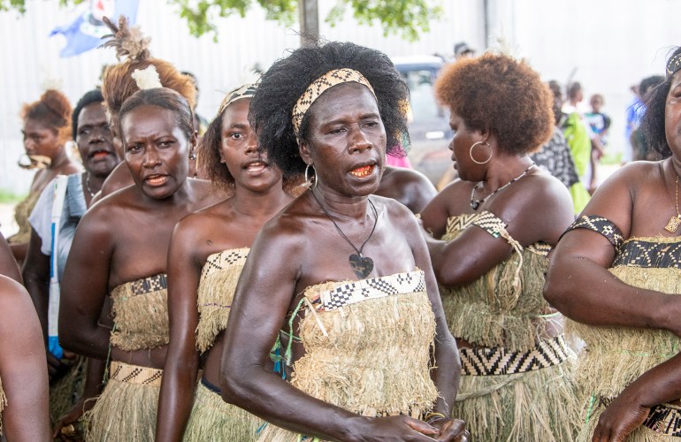 Bougainville resideWomen in traditional dress gather at a polling station to vote in the independence referendum