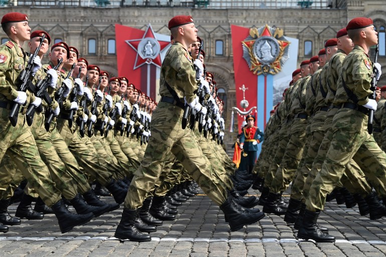 Russian servicemen march on Red Square during the general rehearsal of the Victory Day military parade in central Moscow 