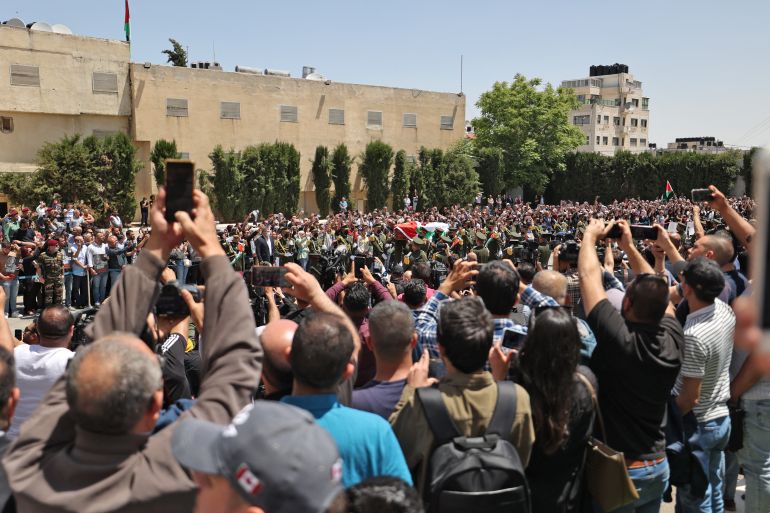 Palestinians attend a state service for veteran Al Jazeera journalist Shireen Abu Akleh.
