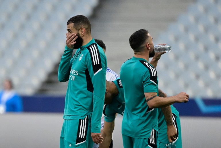 Real Madrid's French forward Karim Benzema reacts during a training session