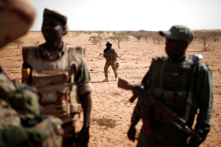 Troops from the Malian Armed Forces are seen conducting an operation near Tin Hama