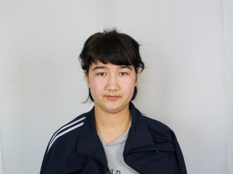 Rahile Memet, as an 18 year-old high-school student in 2018, was sentenced to re-education. Photo Courtesy of the Xinjiang Police Files project.